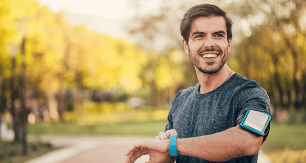 man smiling outdoors